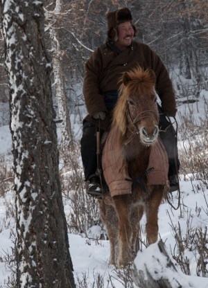 A Winter Afternoon in the Darkhid Valley. Herder Yadmaa and his Horse on "patrol".